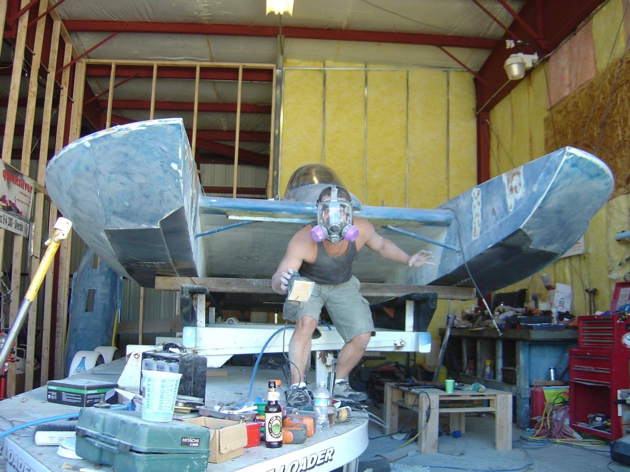 Justin working on a hydroplane in the shop